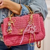 image:imageBaubleBar Disney Characters Signature Bag CharmDaisy