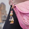 image:imageBaubleBar Licensed 3D Bag Charms for All Ages  Cute Character Keychains to Display on Backpacks and PursesDaisy Duck  Pav