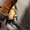 image:imageBaubleBar Licensed 3D Bag Charms for All Ages  Cute Character Keychains to Display on Backpacks and PursesPeanuts  Snoopy