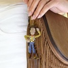 image:imageBaubleBar Licensed 3D Bag Charms for All Ages  Cute Character Keychains to Display on Backpacks and PursesToy Story  Woody