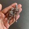 image:imageBaubleBar Seasonal Novelty Earrings for Women  Beautiful and Giftable Holiday and Themed Earrings for Parties and EventsPave Skeleton