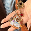 image:imageBaubleBar x Disney Dynamic Duo Bag Charm  Perfect for Accessorizing Your Purse or Backpack  Disney Lover Gifts for All AgesLady and the Tramp