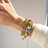 image:imageBaubleBar x Disney Friends Forever Charm Bracelet  Pull Tie Bracelet with Chunky Beads Disney Characters Fashion Jewelry Stackable and Stylish Accessories for WomenPeanuts