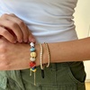 image:imageBaubleBar x Disney Friends Forever Charm Bracelet  Pull Tie Bracelet with Chunky Beads Disney Characters Fashion Jewelry Stackable and Stylish Accessories for WomenPeanuts