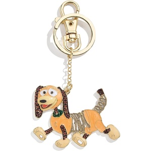 image:imageBaubleBar Licensed 2D Bag Charms  Assorted Character Keychains for All Ages  Perfect for GiftingToy Story  Slinky Dog